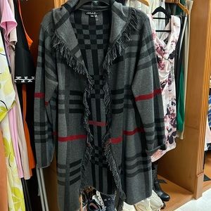 Fringed cardigan with hoodie.